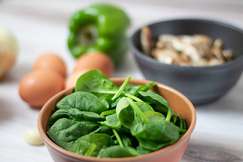 bowl of spinach for is spinach healthy
