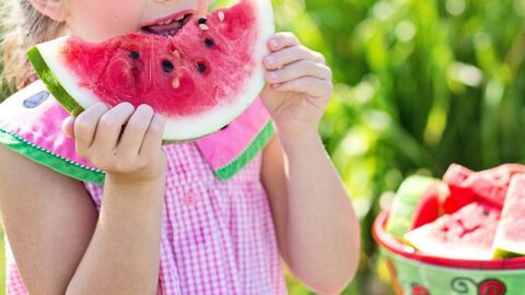 girl eating watermelon for is watermelon healthy for you