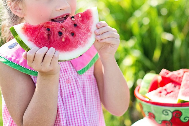 girl eating watermelon for is watermelon healthy for you